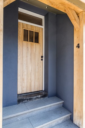 Foto - Te koop: Een woning voor de toekomst met een energielabel van A+++ met een multifunctionele ruimte      (ca 25 m2) en tuin met eiken overkapping en grote eiken carport in het Heuvelland.